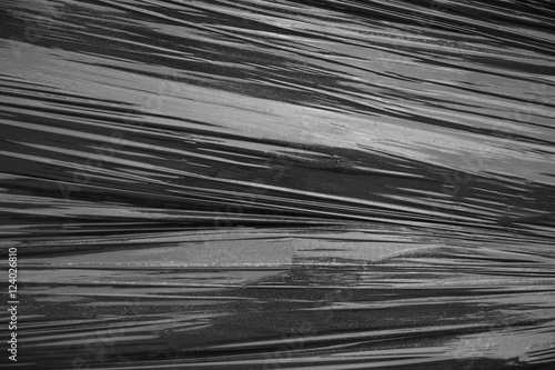 A whole page of stretched black plastic background texture