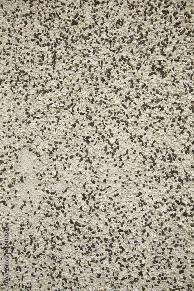 A whole page of speckled stone wall background texture A whole page of speckled stone wall background texture