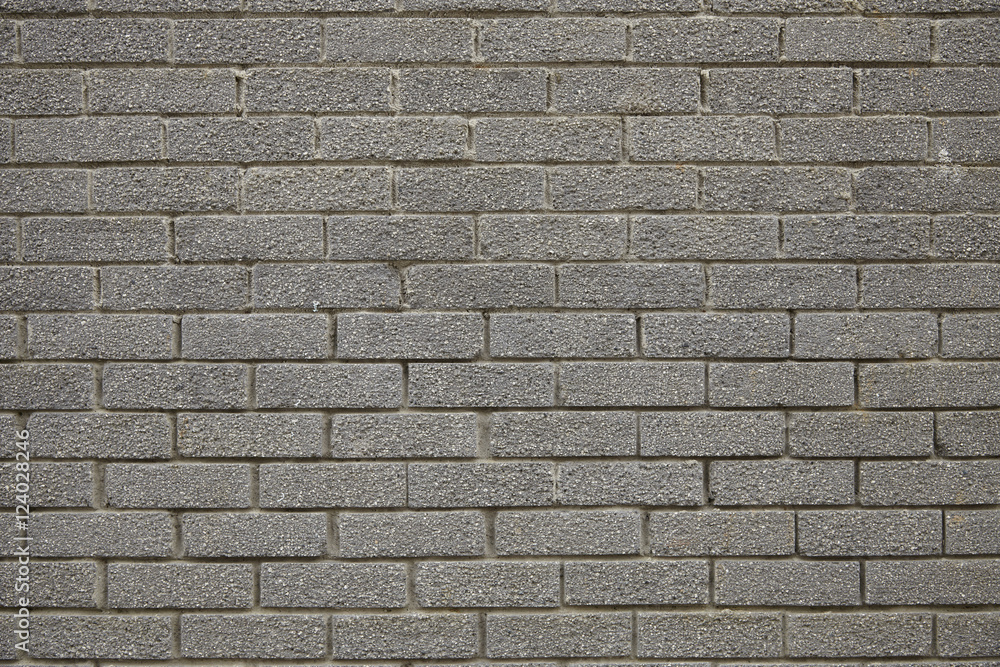 A whole page of grey brick wall background texture A whole page of grey brick wall background texture