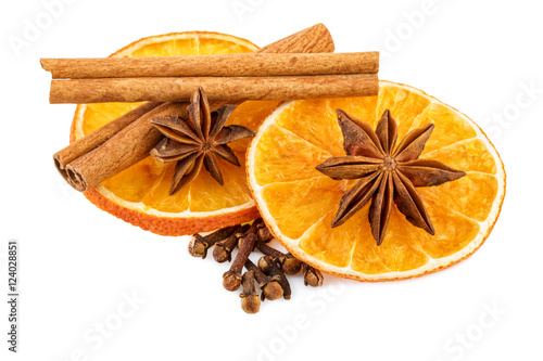 Dried orange slices with cloves and cinnamon sticks. Traditional Christmas spices isolated on white.