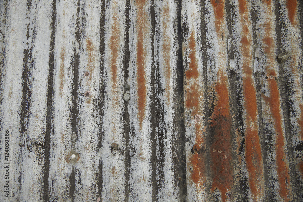 A whole page of decaying corrugated metal roof background texture