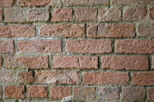 A whole page of weathered red brick wall background texture 