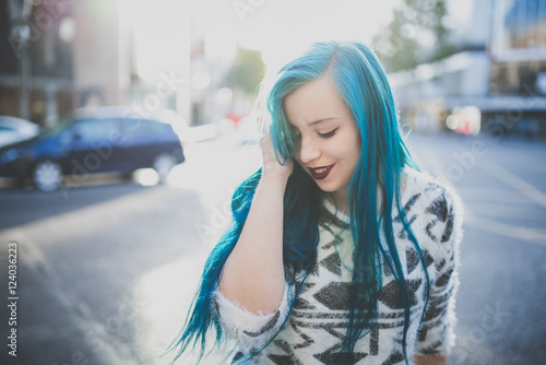 Young girl with blue hair. photo