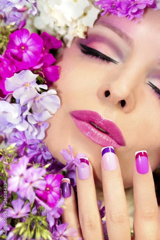 The French pink lilac manicure and makeup with phloxes on the girl. The French pink lilac manicure and makeup with phloxes on the girl.
