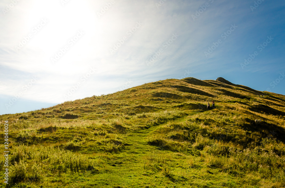 Obraz premium Green hill in summer