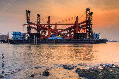 The merchant ship dockyard and port in gulf sea, Chonburi Province, Thailand photo