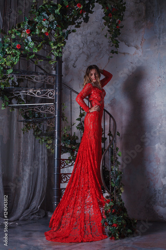 Girl in red dress enthralling