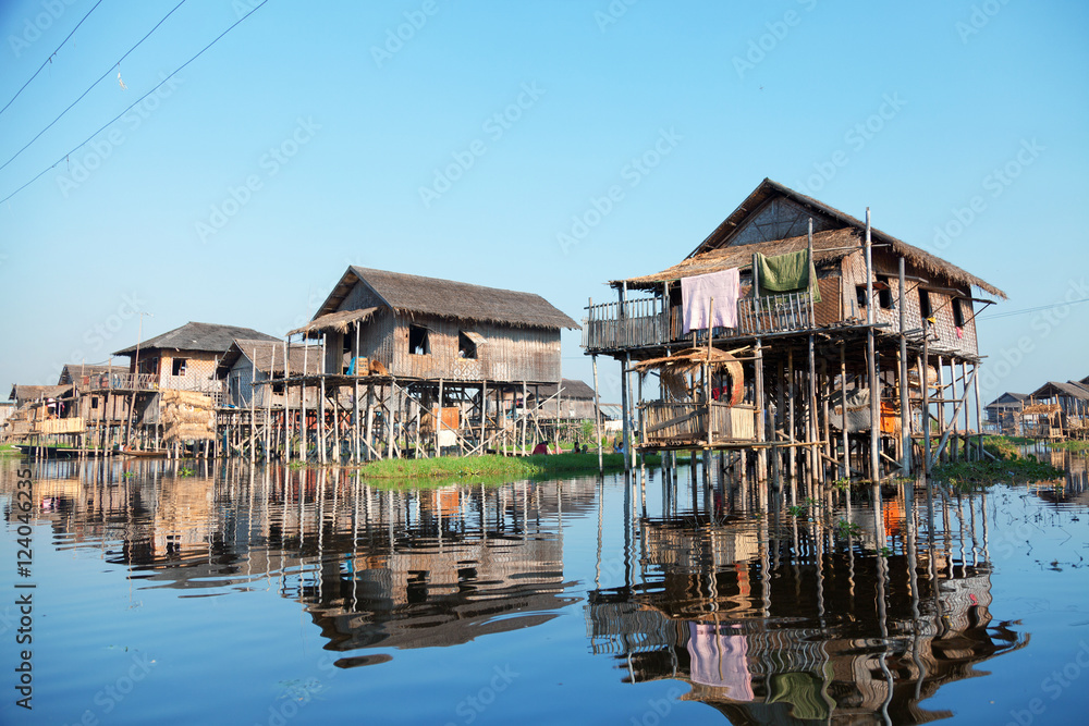 Traditional floating village houses in Inle Lake Traditional floating village houses in Inle Lake