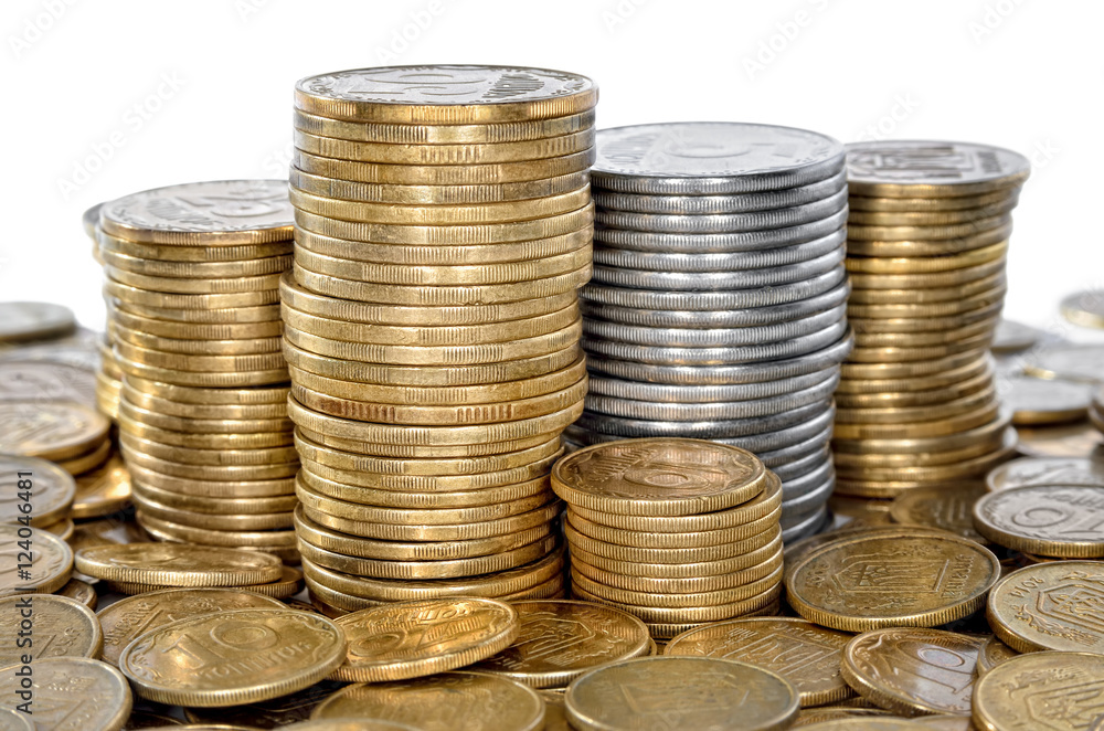 Many coin bank of yellow and white metal. Cash closeup. Many coin bank of yellow and white metal. Cash closeup.