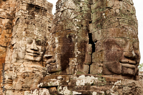 Three faces in Bayon Temple at daylight, Angkor Wat, Cambodia