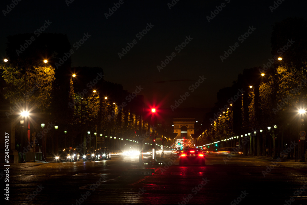 Famous Champs Elysee boulevard in Paris at night