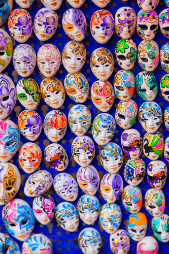 Large group of generic Venetian masks. Vertical shot