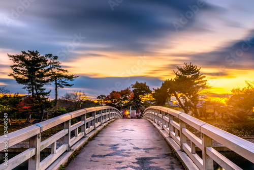 Low light scenery sunset of bridge over the river in Uji, Kyoto photo