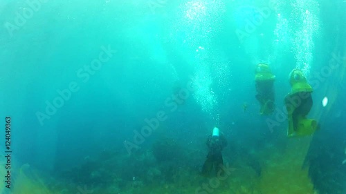 POV snuba divers in Caribbean Sea. photo