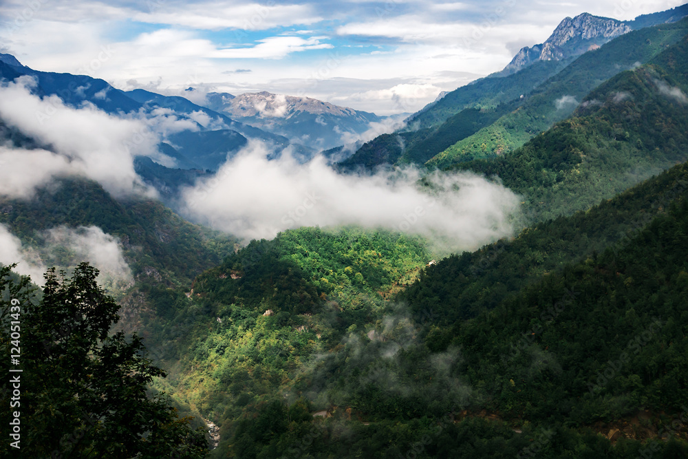 High mountains and clouds, beautiful nature landscape