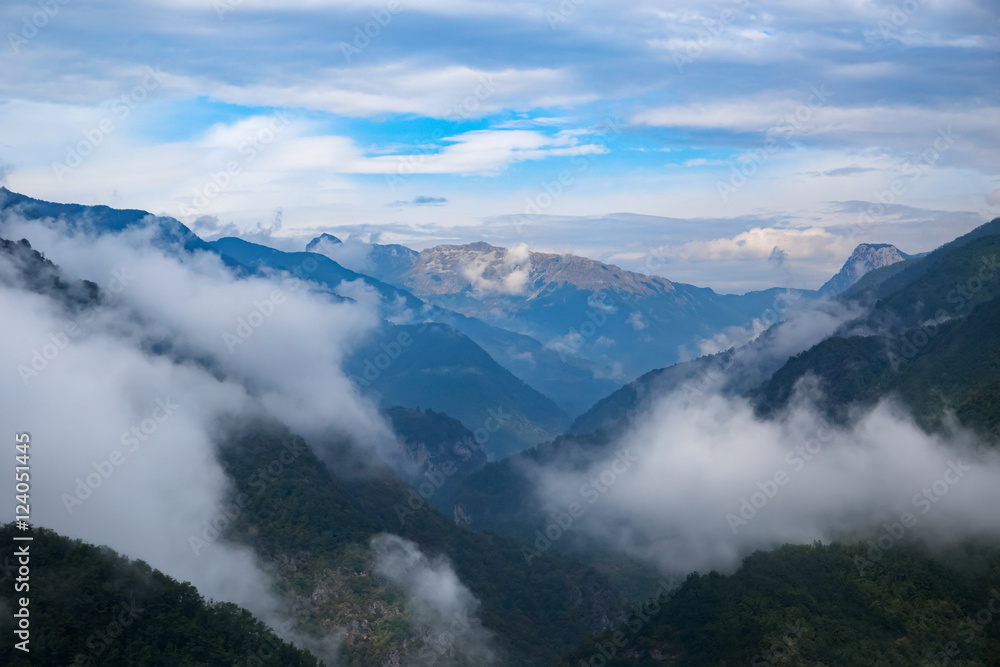 High mountains and clouds, beautiful nature landscape