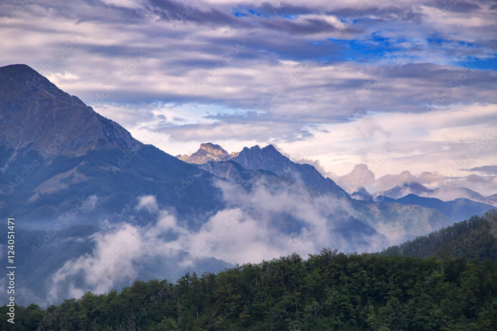 Obraz premium High mountains and clouds, beautiful nature landscape
