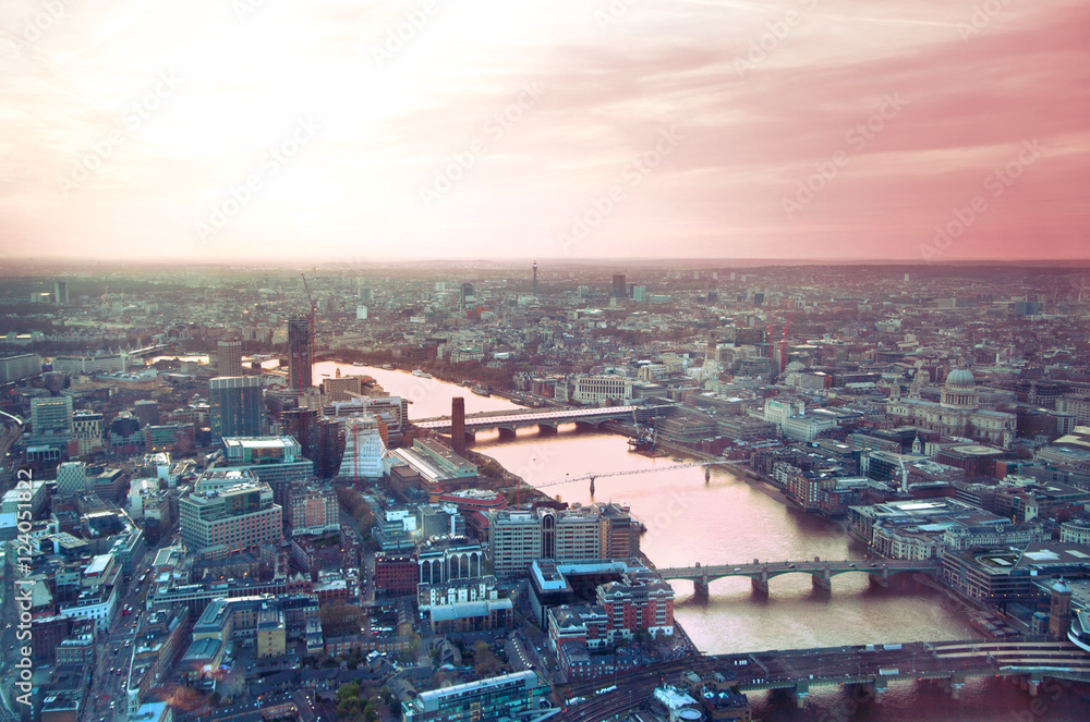 City of London panorama in sunset. River Thames and bridges