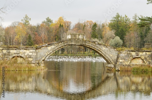 Ancient bridge on the lake. © borroko72