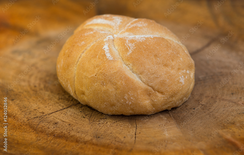  homemade bread rolls on wood background