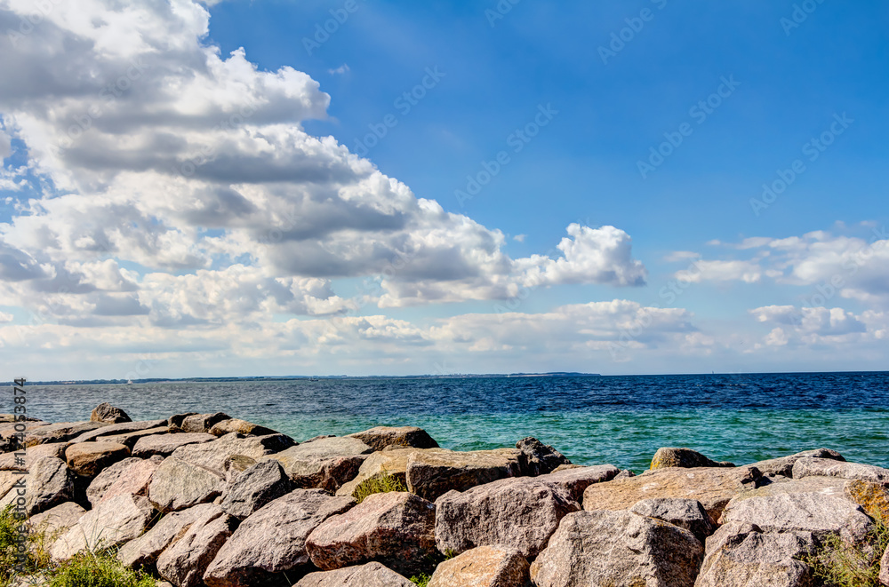 Coastline of the Baltic Sea in summer with foundling stones at Poel island, Germany Coastline of the Baltic Sea in summer with foundling stones at Poel island, Germany