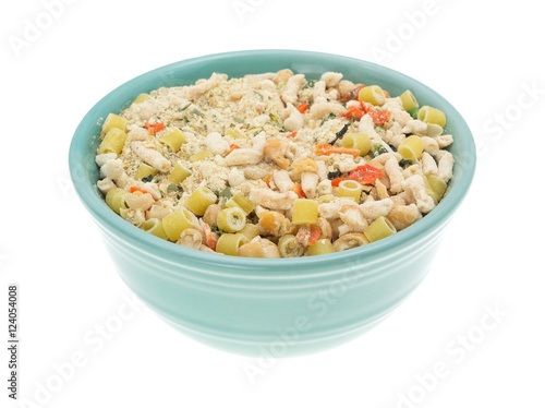 White bean dry soup mix in a bowl isolated on a white background.