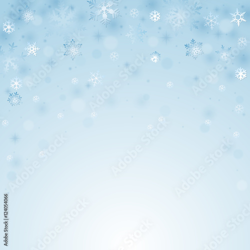 Blue winter christmas background with snowflakes