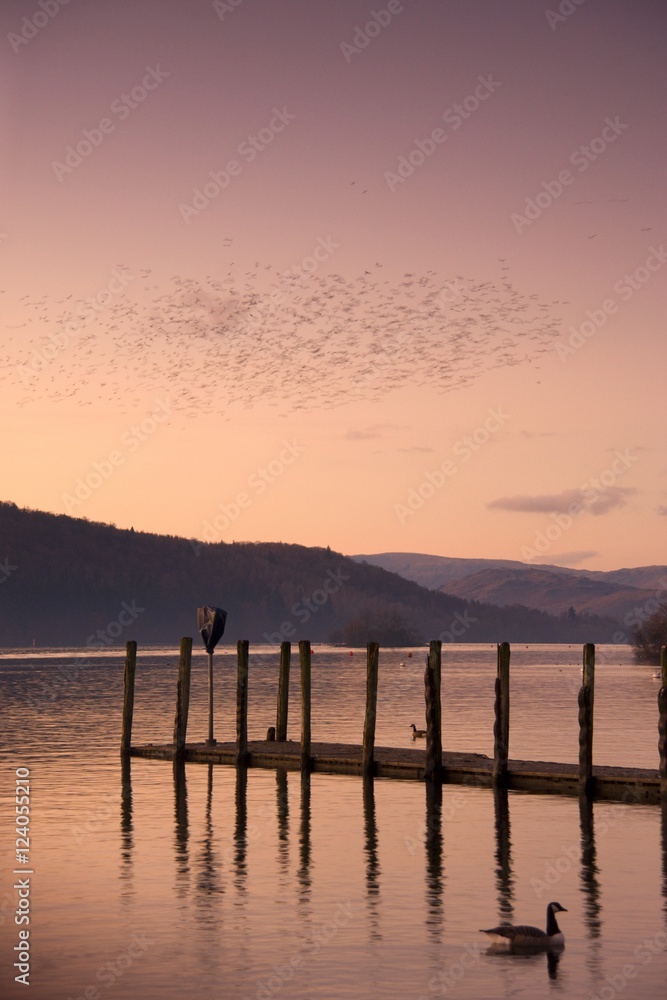 Sunset Over A Dock In The Lake, England