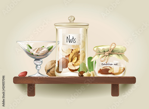 Nuts in glass jars on wooden shelf