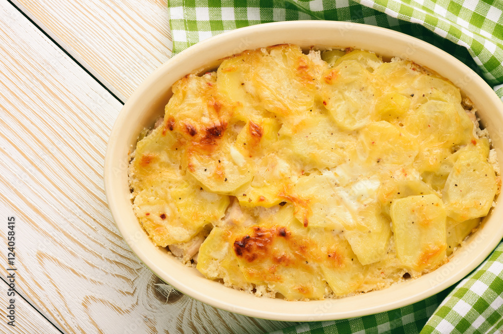 Casserole with chicken, potatoes, leek and cheese. Casserole with chicken, potatoes, leek and cheese.