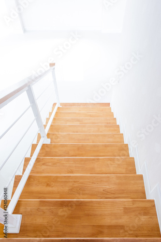 The modern wooden stair way in home close up. © DG PhotoStock