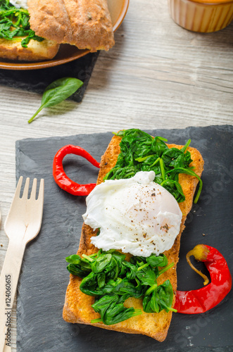 Toasted baguette with poached egg