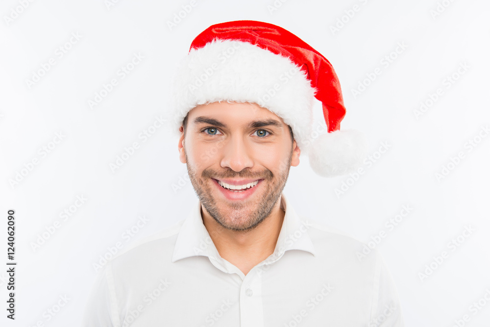 Attractive smiling man in santa claus hat Attractive smiling man in santa claus hat