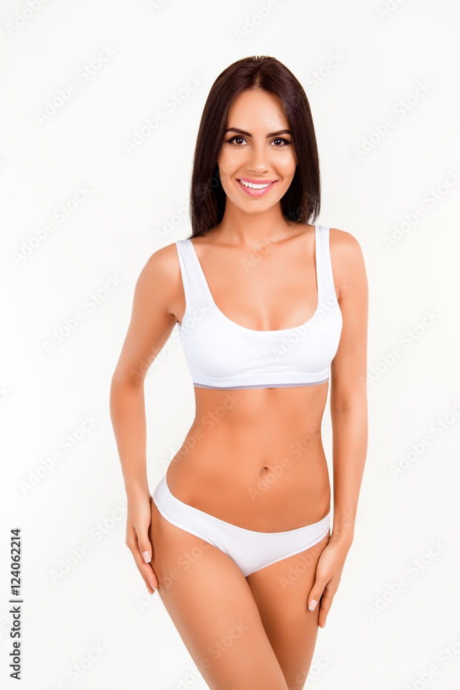 Healthy slim woman with perfect body in white underwear Healthy slim woman with perfect body in white underwear