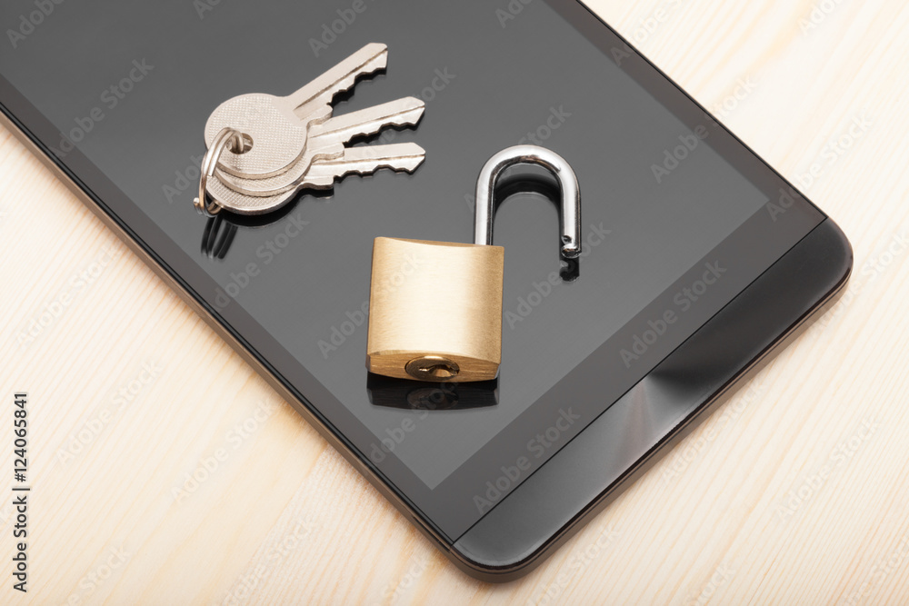 Smartphone with small lock and keys. Mobile phone security and data protection concept