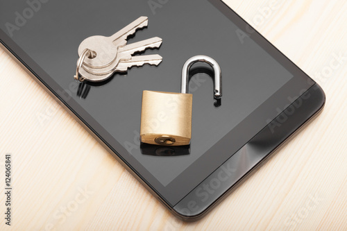 Obraz na płótnie Smartphone with small lock and keys. Mobile phone security and data protection concept w salonie