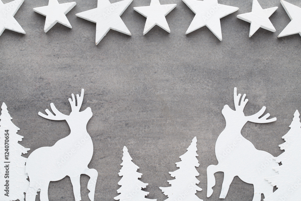 Fototapeta premium Christmas background. White tree decorations on a gray backgroun