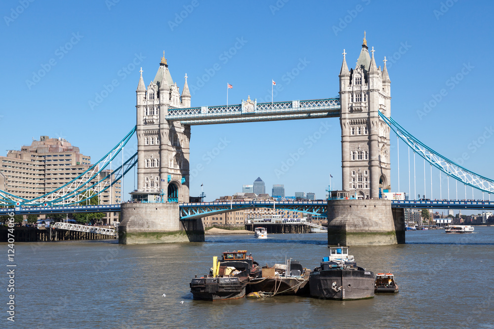 View of the famous Tower Bridge on a sunny day in London, UK.