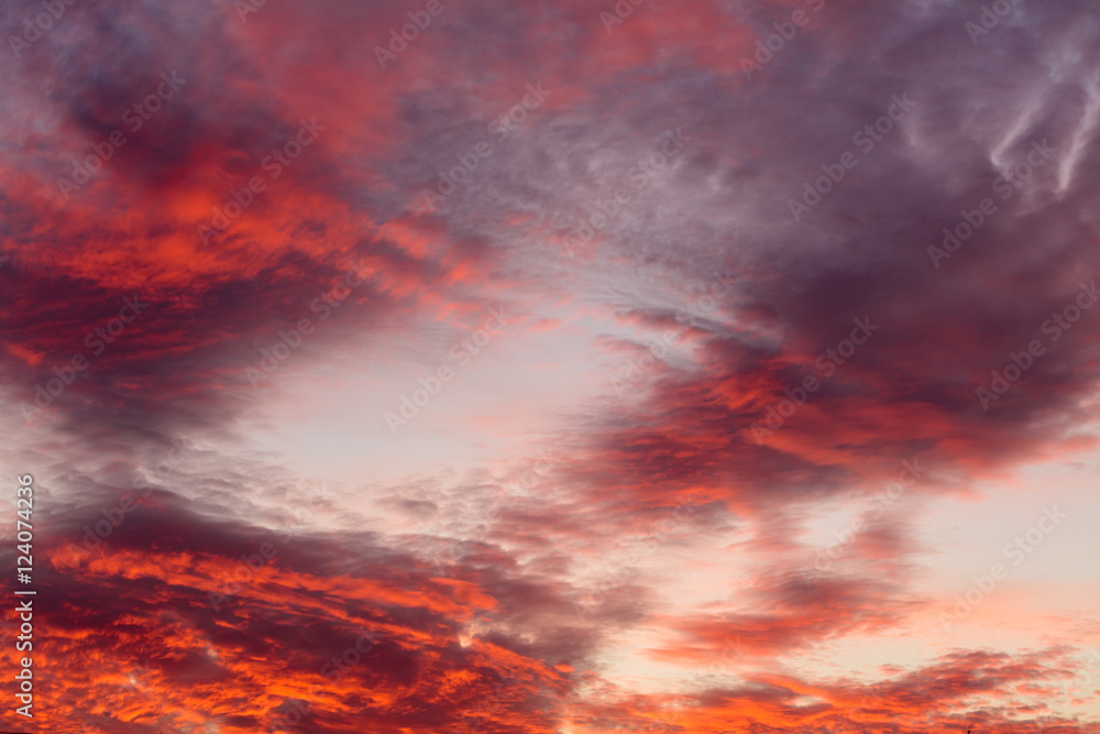 Colorful warm clouds on sky at sunset