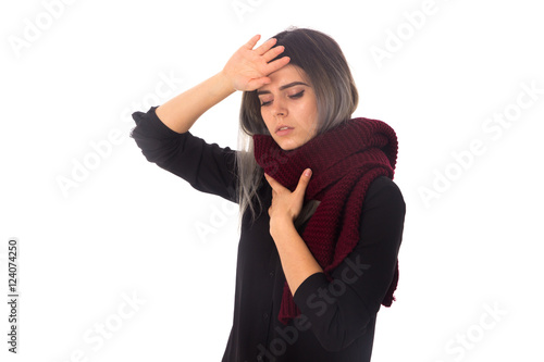 Woman with headache and sore throat 