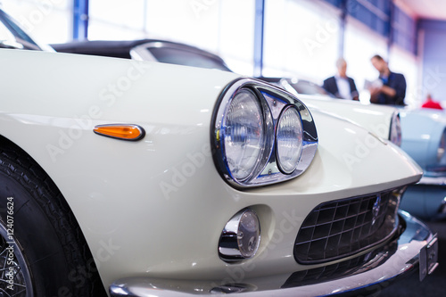 Old cars auction - People viewing cars on sale 