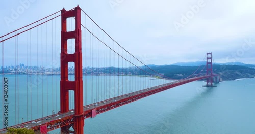SAN FRANCISCO - Circa October, 2016 - A static establishing shot of the Golden Gate Bridge on a foggy overcast day with the city in the distance.  	