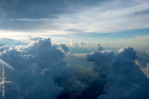View of the clouds and airplane wing from the Inside