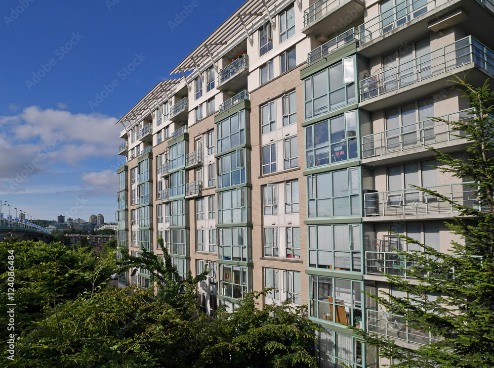 apartment building surrounded by trees