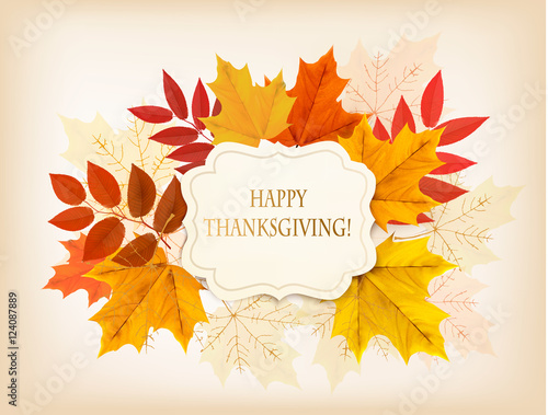 Happy Thanksgiving background with colorful autumn leaves and a