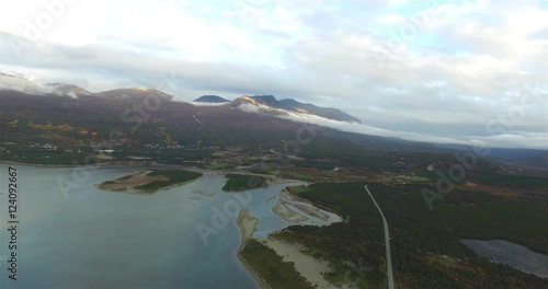 Cinema 4k 90 degree aerial view on the autumn colored mountains surrounding Skibotn town, in Northern Norway photo