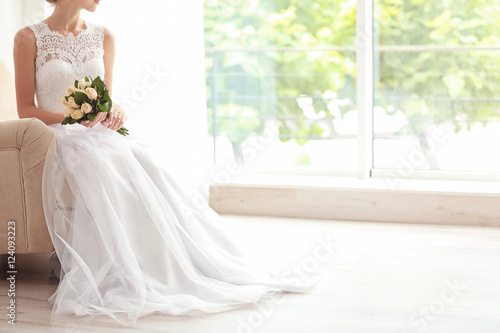 Bride in beautiful dress wi...
