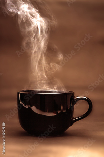  the warm black cup of coffee
