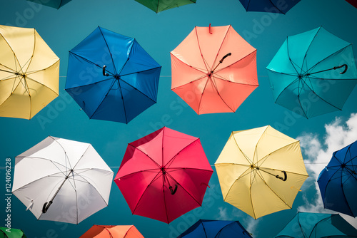 Colorful umbrellas with blue sky background