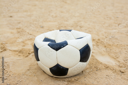 Photos deflated ball forgotten on the football field abandoned
